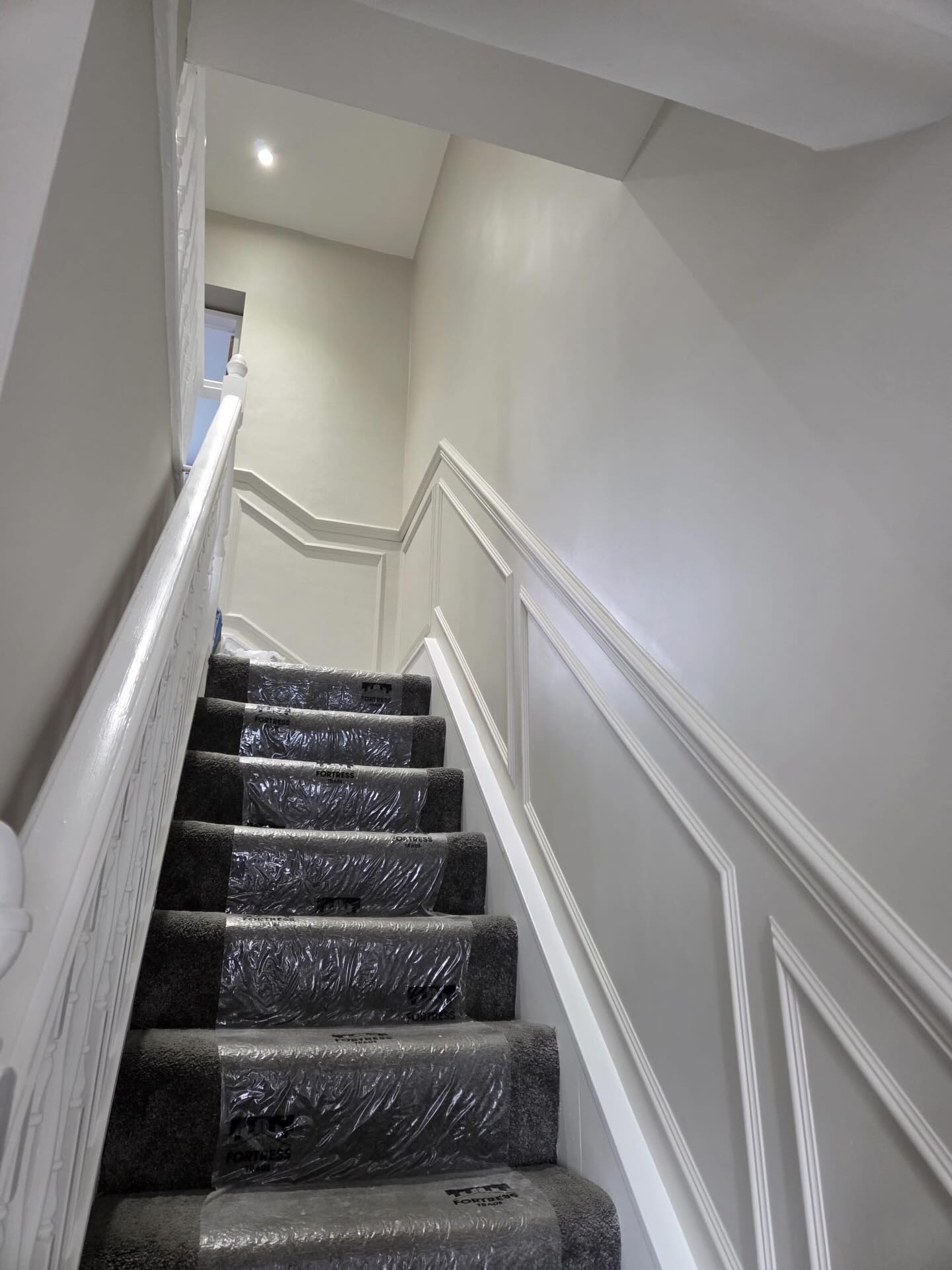 Hand-painted wall panelling on a hall, stairs and landing in Liverpool