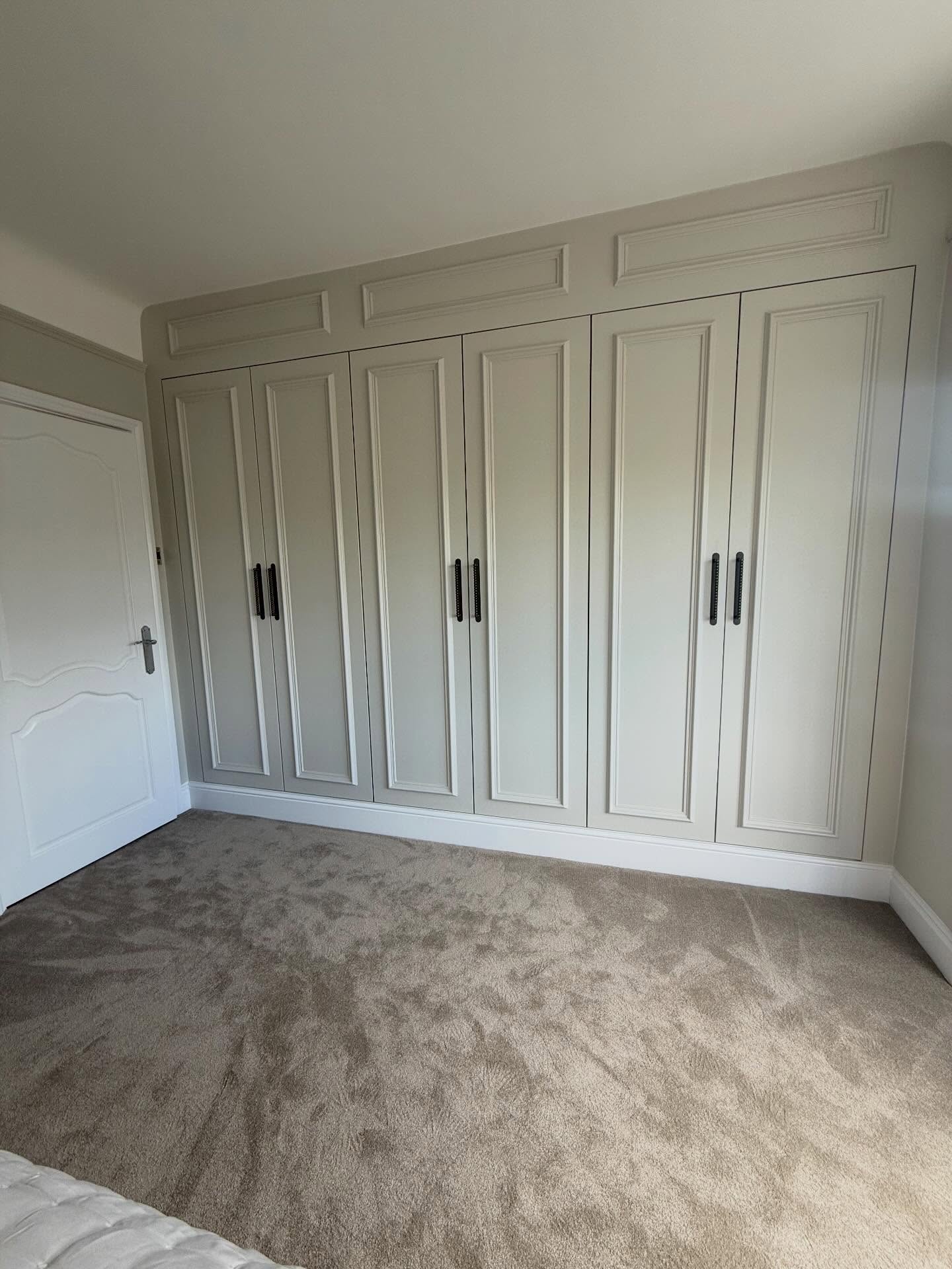 Bespoke fitted wardrobes hand-painted by Hamilton Decorators, Liverpool